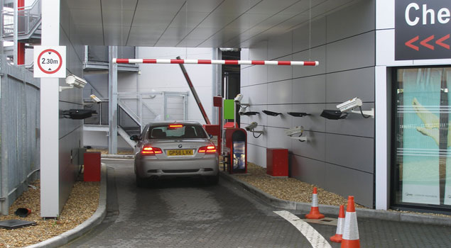 Purple parking vehcile damage recording drive through canopy